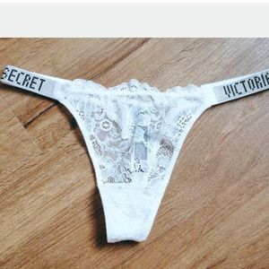 Victoria’s Secret white lace rhinestone logo thong